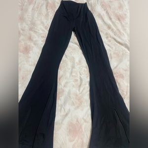 black flair leggings with a slit at the bottom